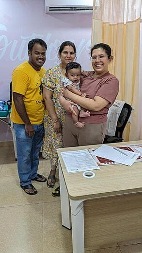 Dr. Anjani Dixit with parents and their toddler at a follow-up visit