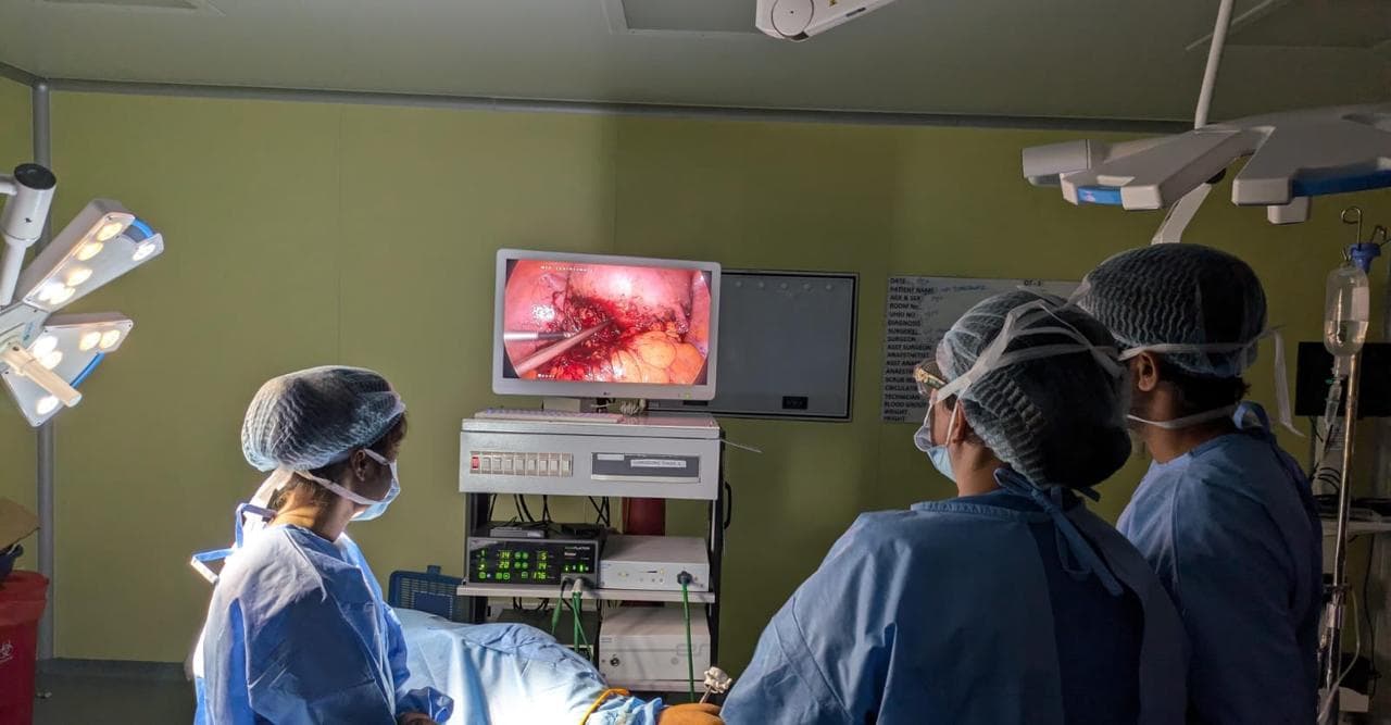 Dr. Anjani Dixit and her team operating, the laparoscope view on the monitor